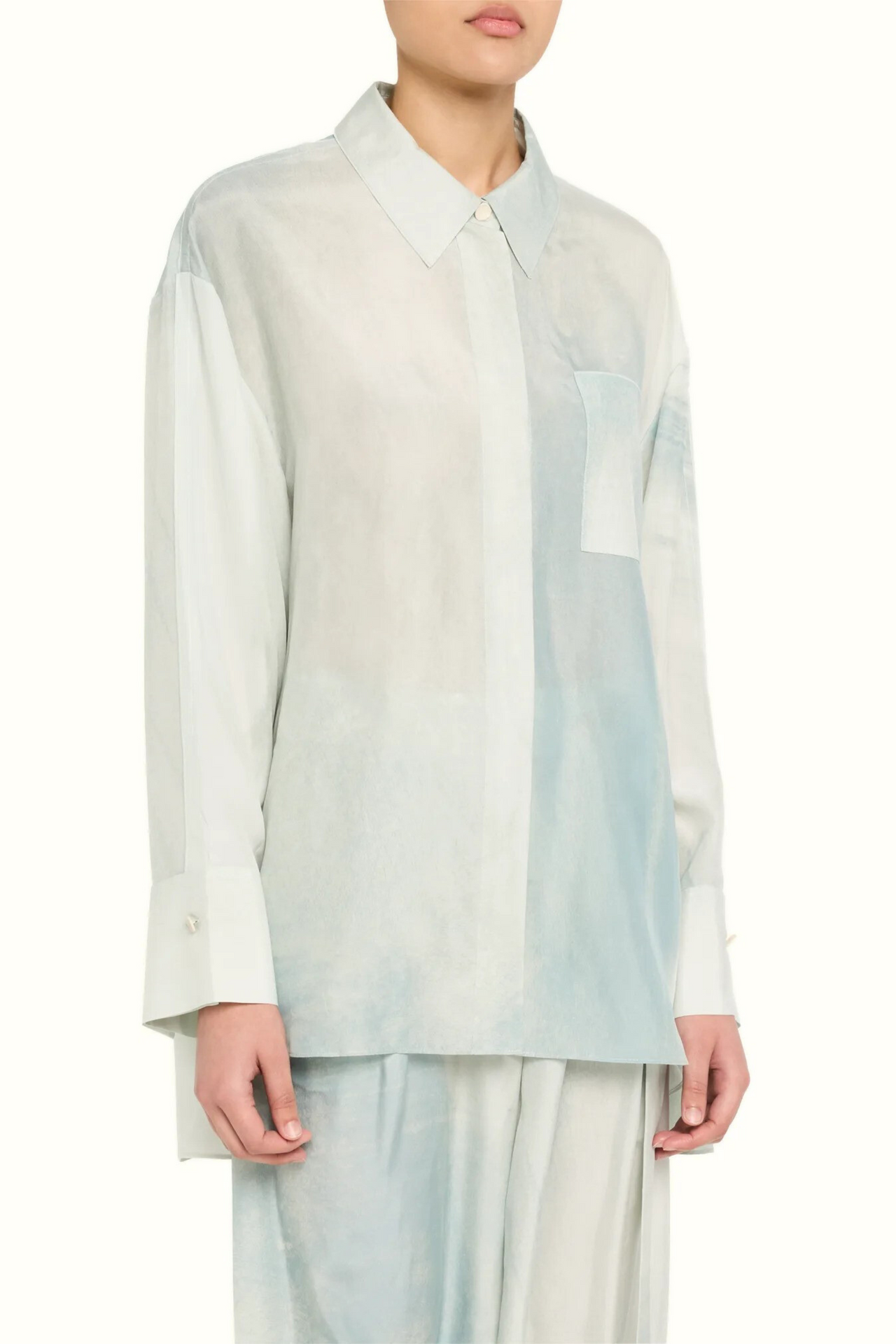 Ice Blue Silk Habotai Oversized Button-Up Shirt – Lightweight and effortlessly chic, perfect for layering or standalone wear.
view 1