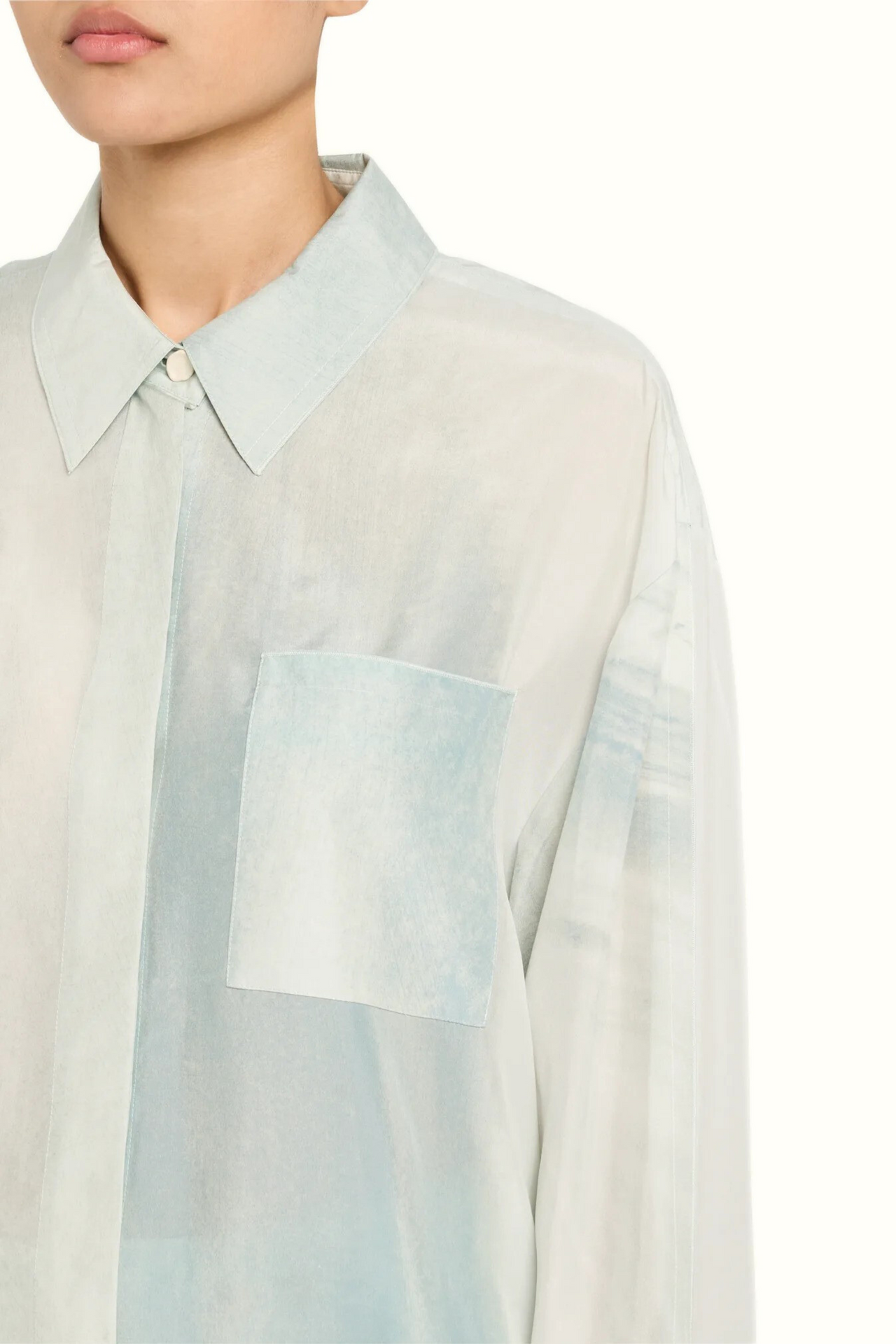 Ice Blue Silk Habotai Oversized Button-Up Shirt – Lightweight and effortlessly chic, perfect for layering or standalone wear.
view 4