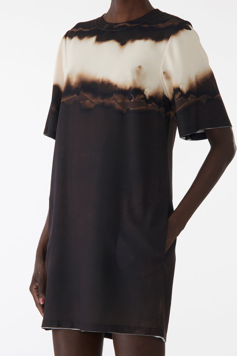 Model wearing a short sleeve shift dress with a dark horizontal stripe across the chest, straight cut, crew neckline, and relaxed fit. view 4