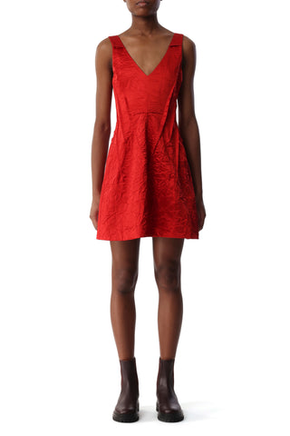 Red  crushed satin mini dress worn by a model 