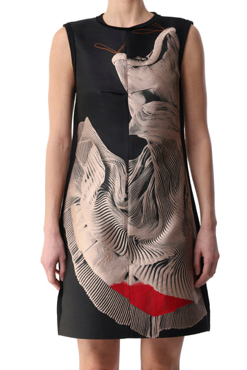 Black sleeveless dress with abstract beige and red design on a white background view 1
