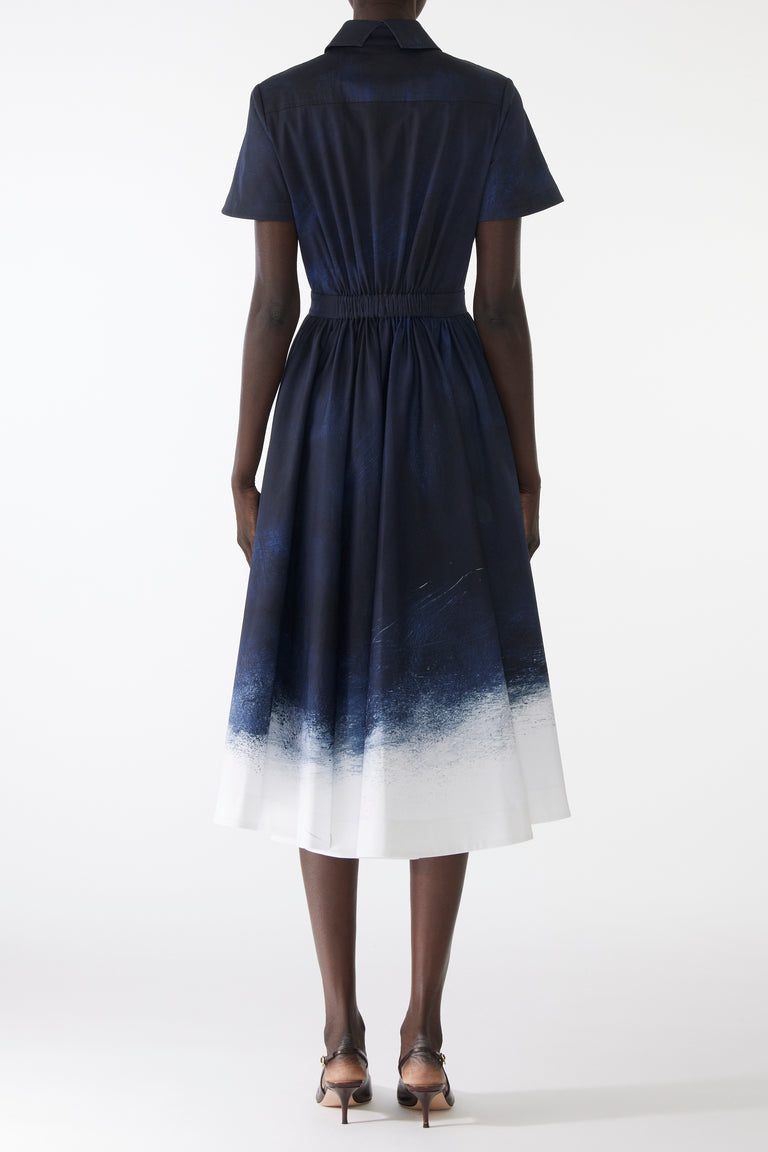 Model wearing a stretch cotton shirtdress with navy-and-white smudged print, featuring a tailored fit, button front, and soft brushed texture view 3