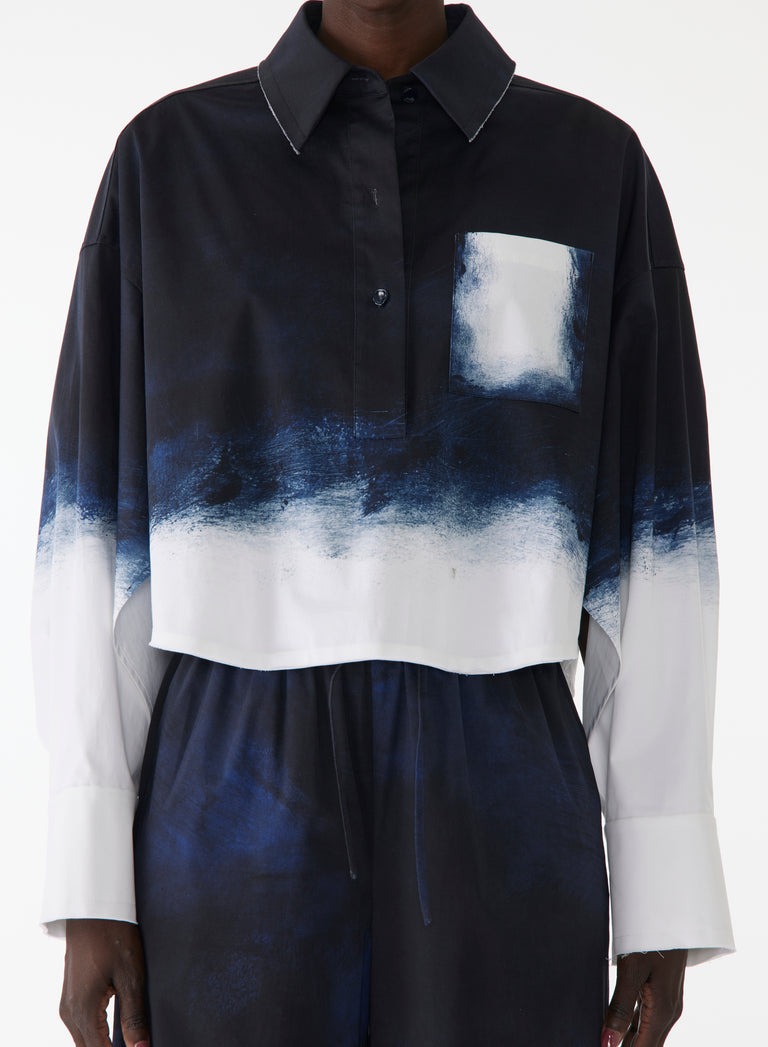 Model wearing navy and white dip-dyed pop-over shirt in stretch cotton with a relaxed fit and painterly smudged effect. view 4