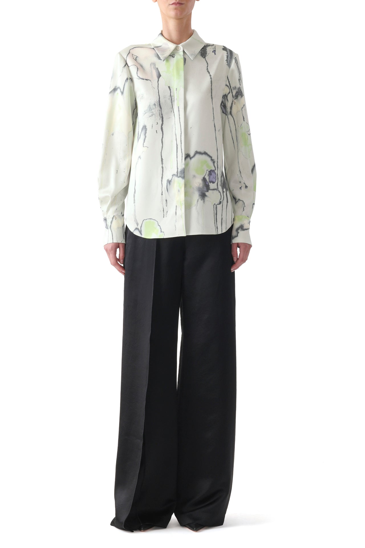 Model wearing a jade multi watercolor floral silk twill button-up shirt with long sleeves and a soft, fluid fit. view 2
