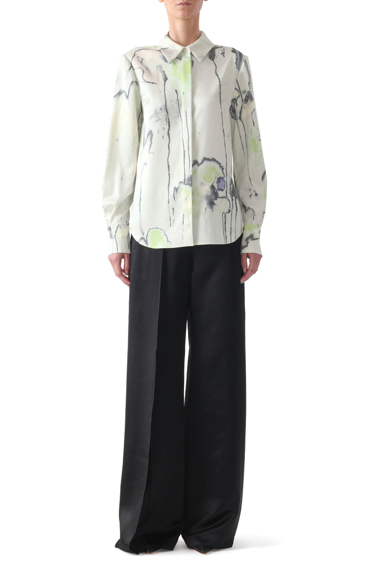 Model wearing a jade multi watercolor floral silk twill button-up shirt with long sleeves and a soft, fluid fit. view 2